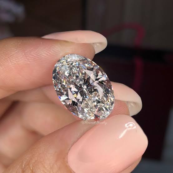 Oval Diamond Ring · 9.51ct — before